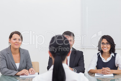 Business people folding their hands and listening