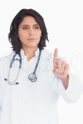 Doctor pointing the finger in the air