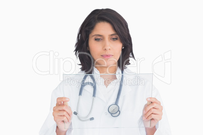 Doctor holding virtual screen