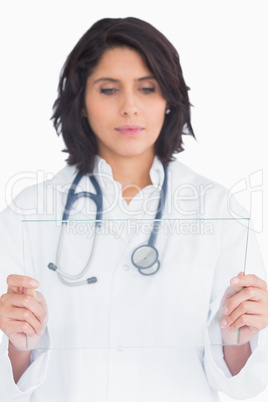 Doctor holding virtual screen