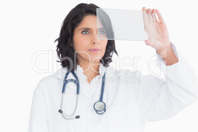 Doctor examining virtual screen