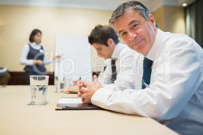 Smiling businessman during meeting