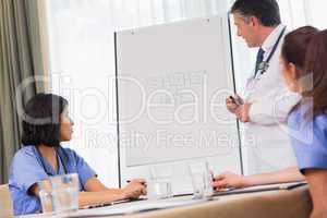 Doctor presenting figures