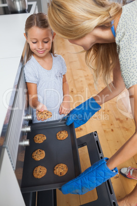 Daughter taking a cookie