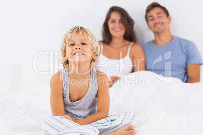Boy sitting and smiling