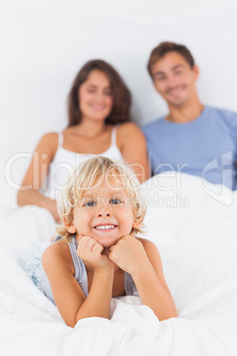 Boy lying on the bed