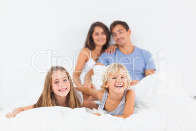 Offspring lying on the bed