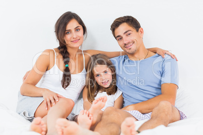 Cheerful family sitting