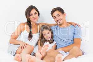 Cheerful family sitting