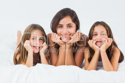 Mother and her children looking at camera