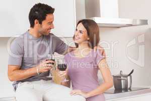 Couple toasting with a glass of wine