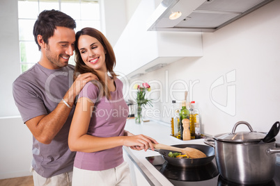 Woman preparing food at the stove