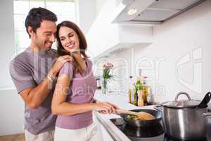 Woman preparing food at the stove