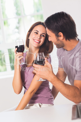 Smiling couple with wine