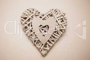 Wicker heart ornament with paper cut out