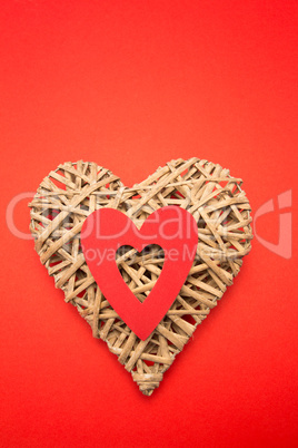 Wicker heart ornament with red cut out