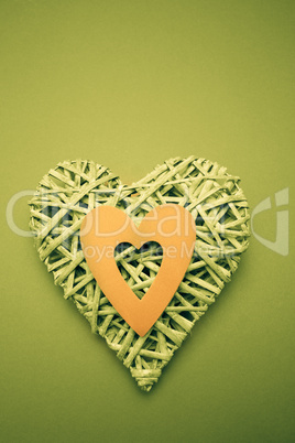 Wicker heart ornament with green paper cut out