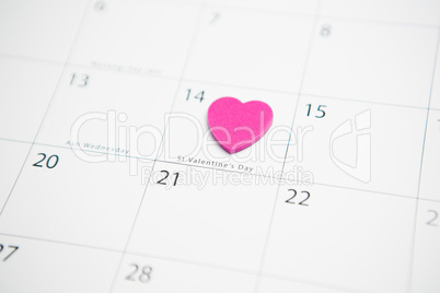 Pink heart marking valentines day on calendar