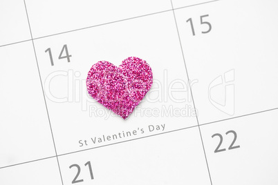 Pink glittering heart marking valentines day