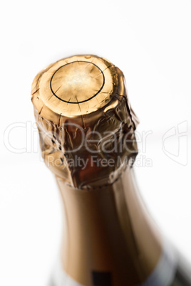 Close up of top of champagne bottle