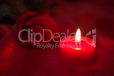 Candle with red rose