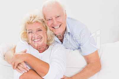 Old couple hugging