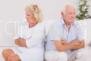Unhappy woman being angry against an old man
