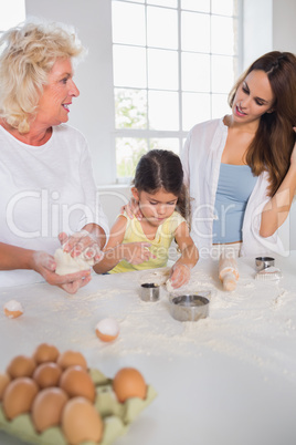 Women of a family baking together