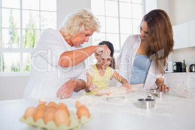 Women of a family baking