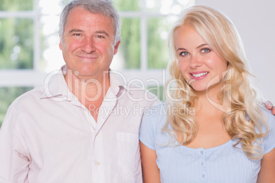 Portrait of a father and his adult daughter