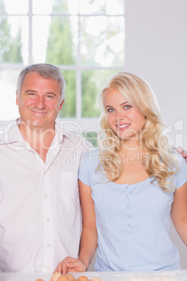 Portrait of a father and adult daughter