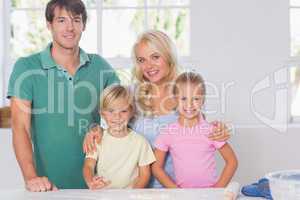 Smiling family baking