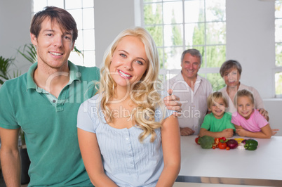 Portrait of couple with their family