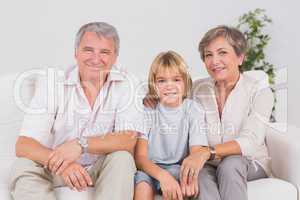 Portrait of a little boy and his grandparents