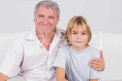 Portrait of a little boy and his grandfather