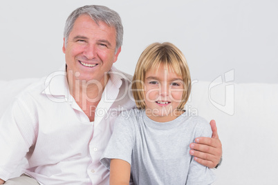 Portrait of a child and his grandfather