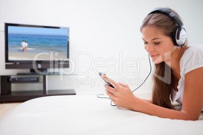 Woman listening to music on her mp3 player