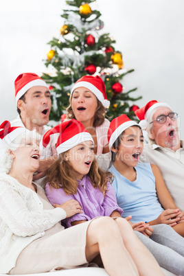 Extended family singing carols