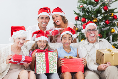 Family exchanging christmas presents