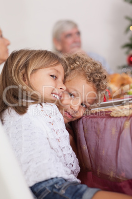 Siblings joking with each other at christmas