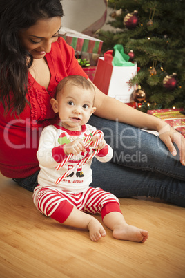 Ethnic Woman With Her Newborn Baby Christmas Portrait