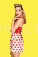 Retro fashion model in red polka dots