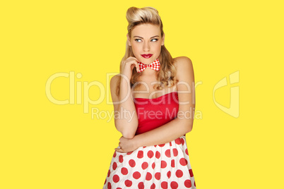 Retro fashion model in red polka dots