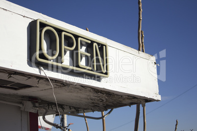 Door for a business with open neon sign