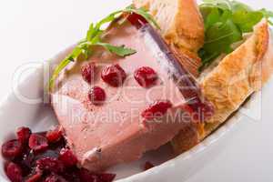 wild pie with aspic and cranberry
