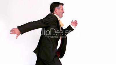 Side view of businessman running 
