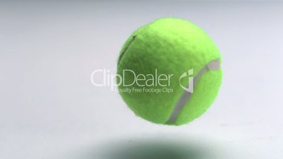 Tennis ball rebounding in slow motion