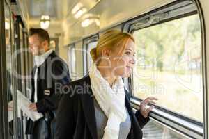 Woman looking out the train window traveling