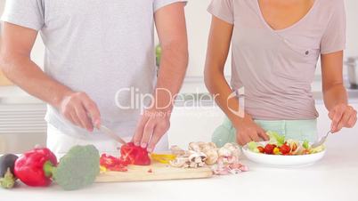 Couple preparing a salad