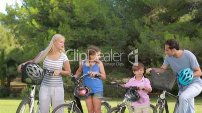 Family biking in the park